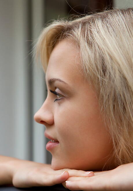 Foxy blonde youthful Luciana A uncovers small tits and hairy pussy outside