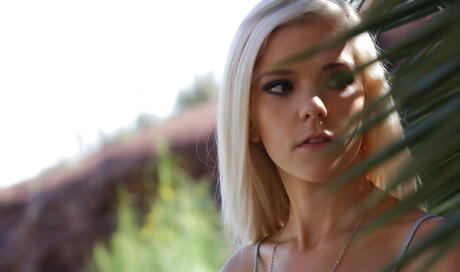 Gracile american blonde teen Halle Von in nice skirt exposes pussy outside